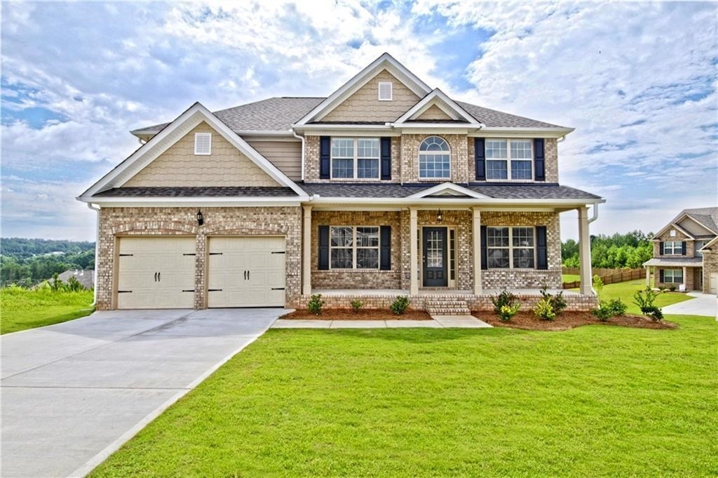 A new home exterior in adairsville at landing at millers ferry